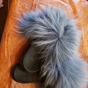 Fox fur slides puma or nike